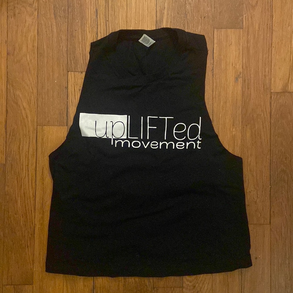 Workout tee with cutoff sleeves, racer back. Brand new, never worn.